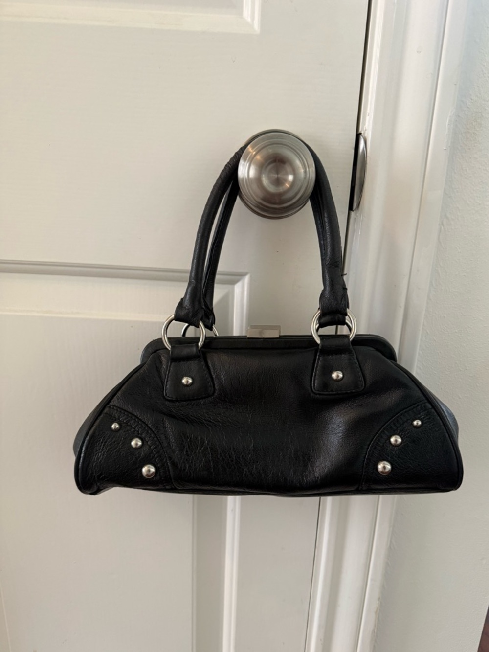 Wilson’s Leather Maxima Black Leather Mini Clutch Purse